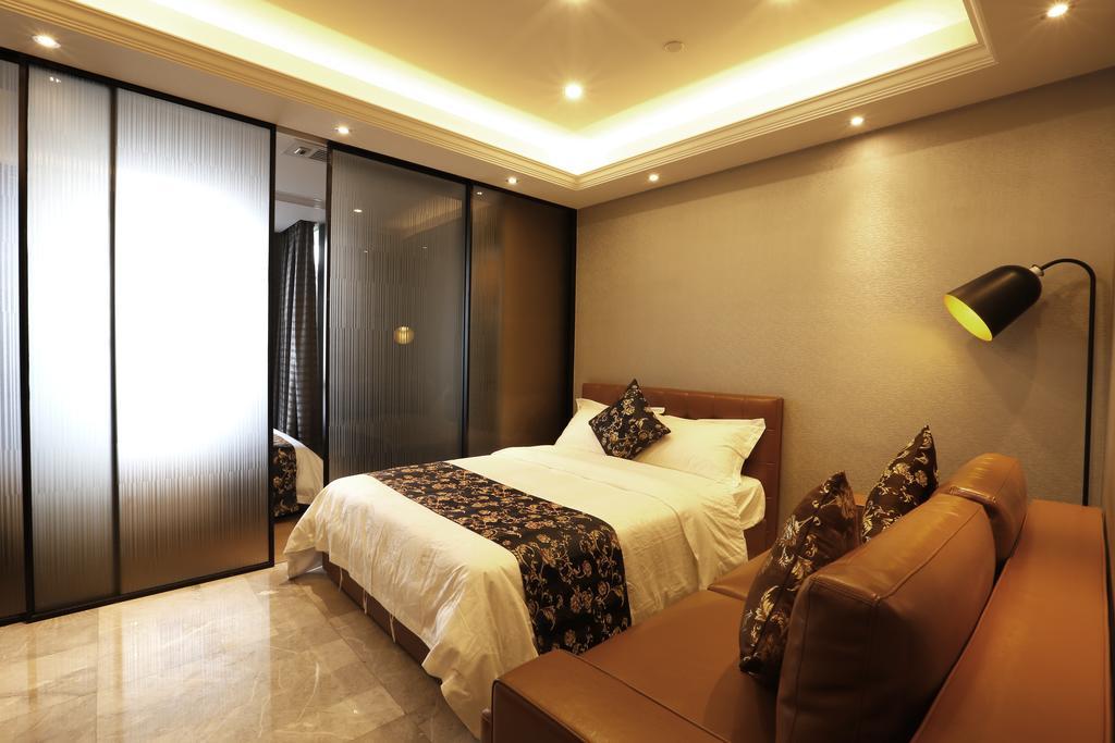 Boman Holiday Apartment Bei Jing Lu Jie Deng Du Hui Branch Guangzhou Exterior photo